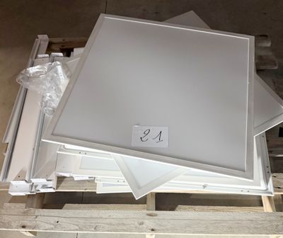 a lot of pieces of white furniture on a pallet