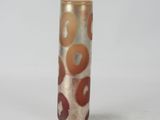 a vase with a design on it on a white surface