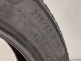 a close up of a tire on a white surface
