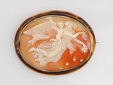 a picture of a picture of an angel on an oval broochle