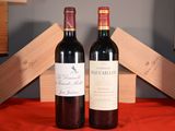 two bottles of wine sitting next to each other on a table