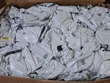 a cardboard box filled with many different types of electronic devices