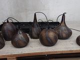six vases that are sitting on a pallet