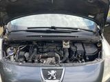 an image of a car with its hood open and the hood open