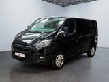 the black van is parked in a large room with white walls