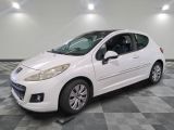 a picture of a white car parked in a garage