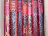 a box full of old books sitting on a table