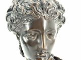statue of a woman with a crown on her head