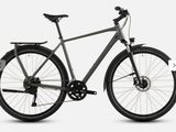 a bike that is parked on a white surface