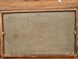 a wooden easel with a chalk board on top of it