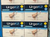 boxes of ungok 2 are stacked on top of each other in a store