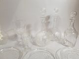 a lot of glass items sitting on a table