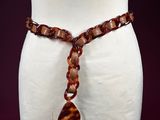 an image of a mannequin torso with a necklace on it