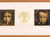 three framed images of a man ' s face and a woman ' s face