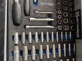 many tools in the tool box on the table