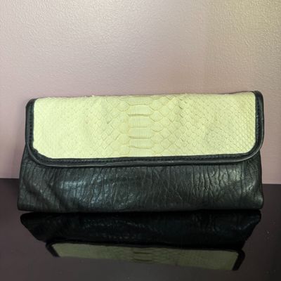 Pochette à main ABACO cuit et python noir et blanc dimension…