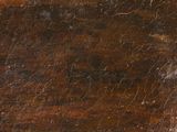 a close up picture of a wooden table with a clock on it