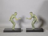 pair of art deco bronze figurines of a man and a woman