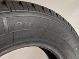 the tire of a car is shown on the floor in the garage