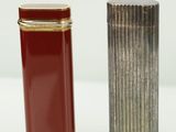 two lighters sitting next to each other on a table