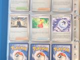 a binder with a lot of pokemon cards on it