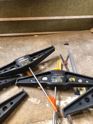 many tools that are laying on the floor together