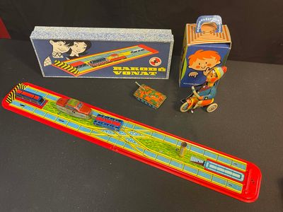 a toy train and a toy car on a table