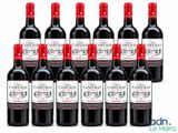 a group of bottles of red wine sitting next to each other