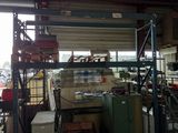 a picture of a warehouse with a lot of equipment in it