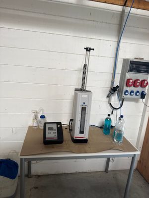 an image of a lab with a table and a machine
