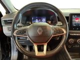 the interior of a car with a steering wheel and dashboard controls