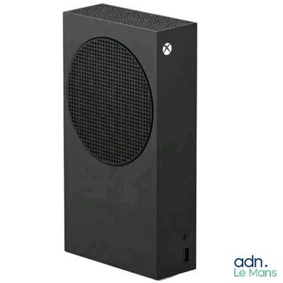 a close up of a black computer speaker on a white background