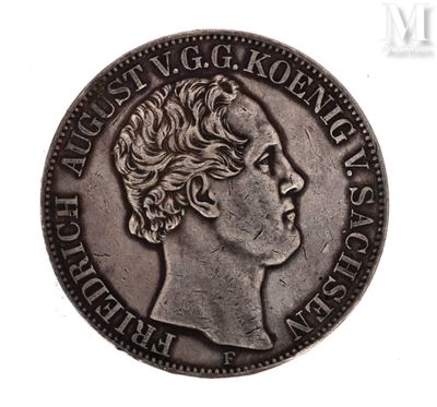 a close up of a coin with a woman ' s face on it