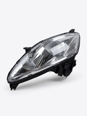 a close up of a car headlight on a white background