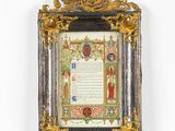 an ornate gold frame with a picture of a woman in a red dress