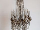 a chandelier hanging from the ceiling in a room