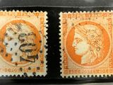 deux timbres orange et noirs représentant une femme et un homme