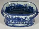 an image of a blue and white bowl with a picture of a castle