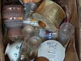 a cardboard box filled with many different types of items