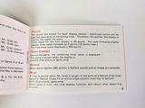 a person holding a book open to a page of information