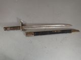 a knife that is laying on top of a table