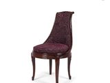 the chair is made of wood and has a purple upholstered upholstered seat