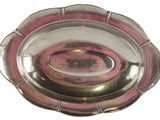 a silver plate with a pink center on a white background