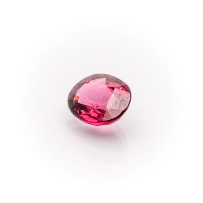 a pink tourmaline gems on a white background