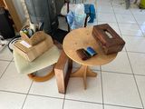 a small table with a suitcase on top of it