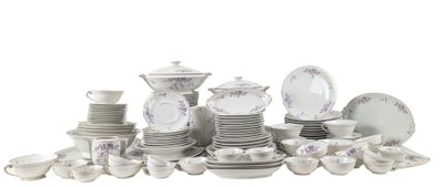 a lot of white and purple plates and bowls