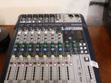 a sound board sitting on top of a wooden table