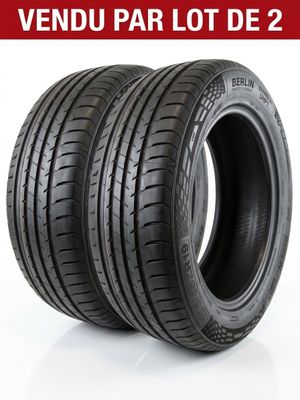 a pair of tires on a white background with the words vendu par lot de 2