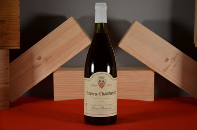 a bottle of wine that is sitting on a table