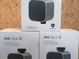 Trois boîtes du nouveau modèle « Eve Aqua 3 » sont posées sur une table.